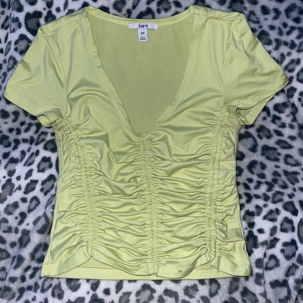 Yellow cropped shirt